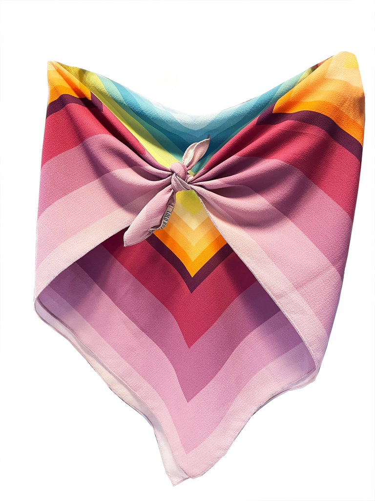 Scarf in silk in joyful colors. The rainbow scarf is a must-have in your wardrobe. This essential Lolo Hoxha accessory complements any outfit. It can be worn many ways- as a top, around your neck, or as a headscarf!  Made in Kosovo Iron & steam